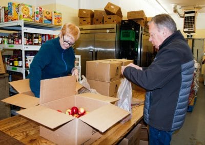 George Watson, volunteering at the food bank.