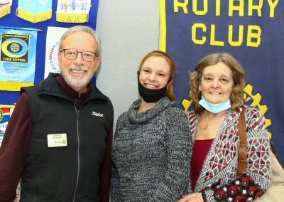 George congratulating Debbie Patterson and daughter, Haley, who attended the Rotary Club of Wasaga Beach meeting and accepted a donation of $8,000 for The Living Wish Foundation.