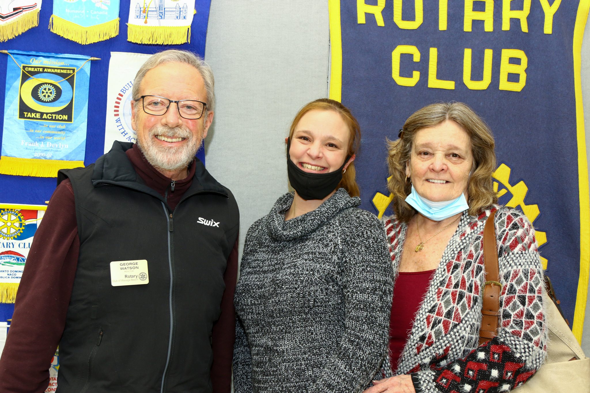 George congratulating Debbie Patterson and daughter, Haley, who attended the Rotary Club of Wasaga Beach meeting and accepted a donation of $8,000 for The Living Wish Foundation.