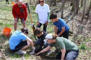 George Watson at St. Noel Chabanel Elementary School Tree Planting with Students