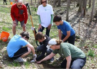 George Watson at St. Noel Chabanel Elementary School Tree Planting with Students